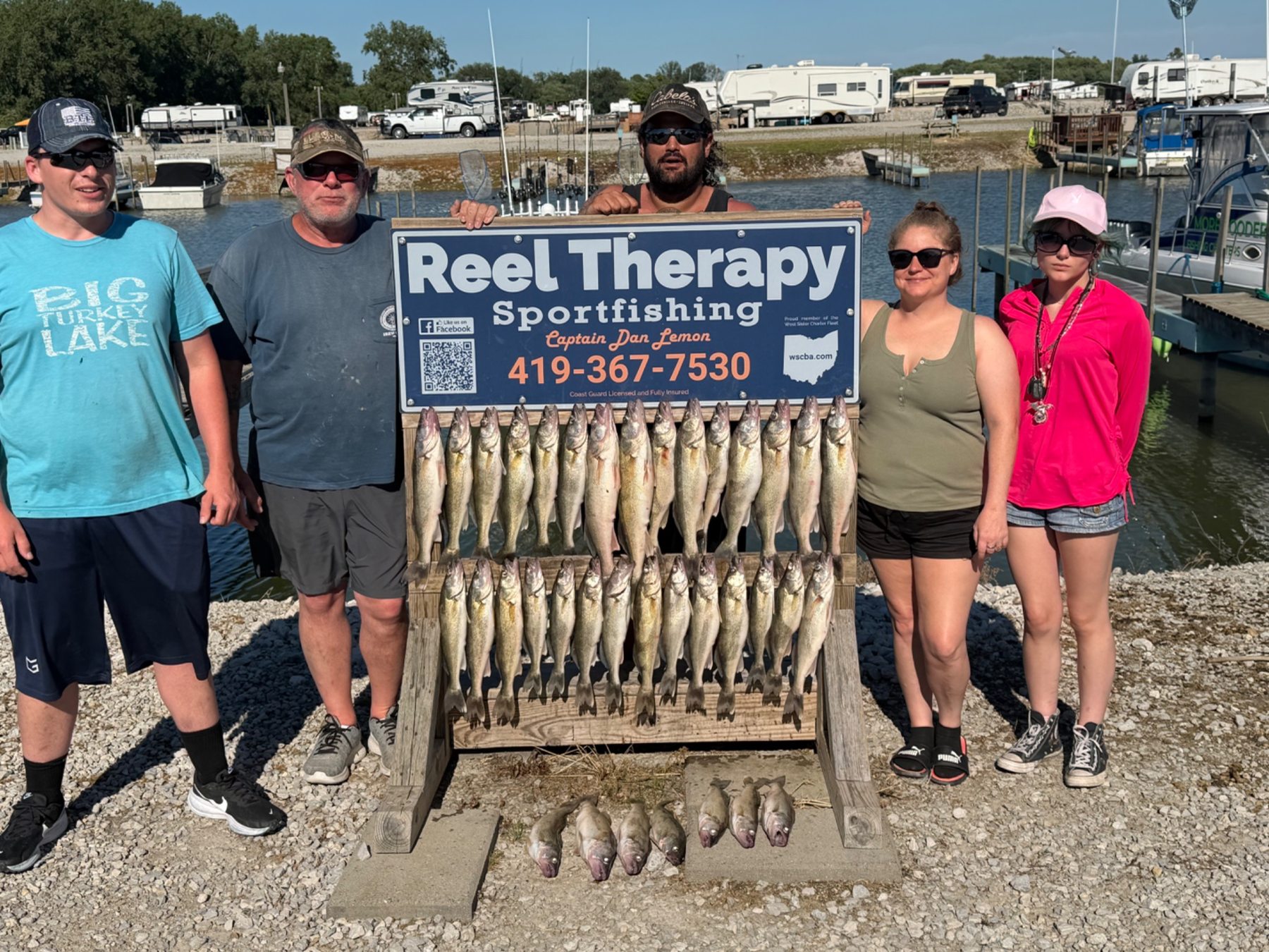 Guests enjoying a Lake Erie fishing charter with Reel Therapy Sportfishing