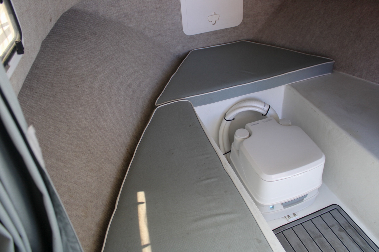 Marine head within the compact cabin space